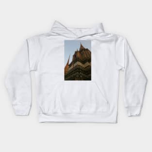 Unusual low angle view of a Buddha pagoda against clear sky. Kids Hoodie